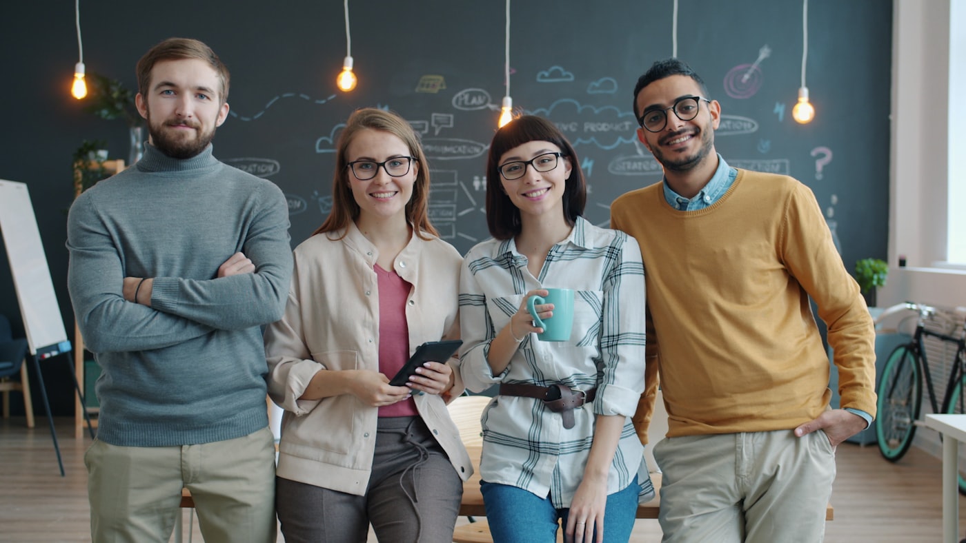Happy team discussion in a modern office